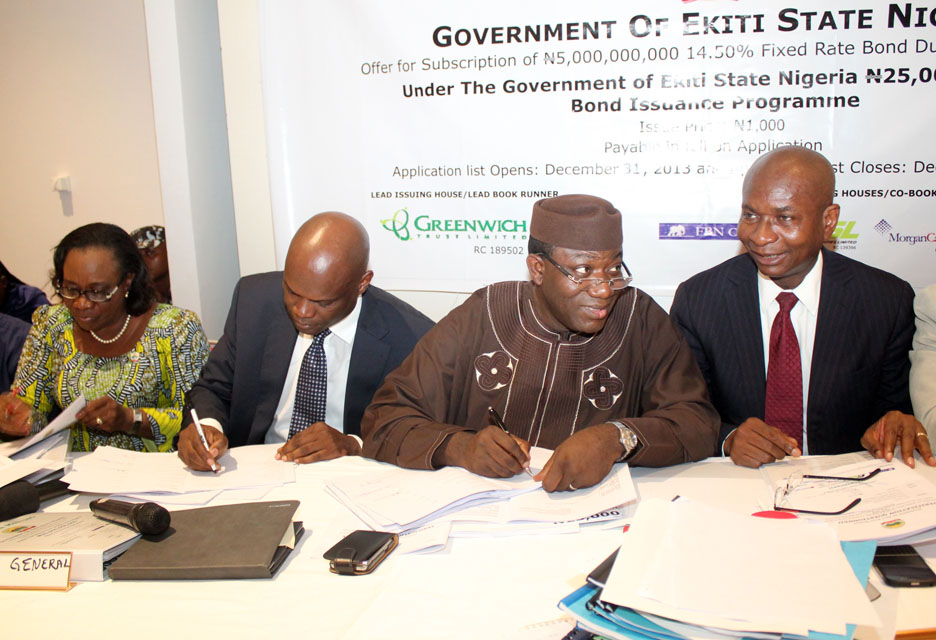 Photo news ekiti state governor dr kayode fayemi signs twenty five