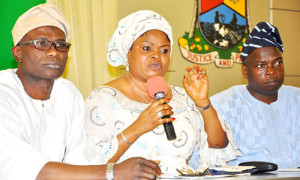 Lagos State Deputy Governor, Hon. (Mrs.) Adejoke Orelope-Adefulire (middle), flanked by Commissioner for Information and Strategy, Mr. Aderemi Ibirogba (left), and the Special Adviser to the Governor on Media, Mr. Hakeem Bello (right), answering questions from Pressmen during a briefing on the state of a pregnant woman, Alexandra Ossai  allegedly battered by her Lebanese boss, Kaveh Noine, at Toppan Printing Company in Ikeja, Lagos at the Banquet Hall, Lagos House Ikeja, on Friday, January 3, 2014.  