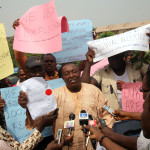 Photo News: Abuja Traders Protest Plans By FCT to Allocate Their Shops to New Owners
