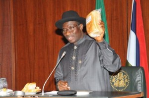 President Jonathan Present Cassava Bread To FEC Meeting 