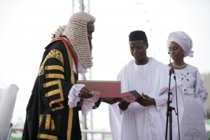 GOODLUCK, OSINBAJO RECEIVING A SIGNED ONSTITUTION FROM CHIEF JUSTICE