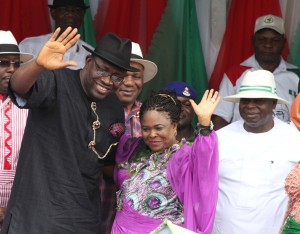 Governor of Bayelsa State, Hon. Seriake Dickson (left) accompanied by the former 1st lady, Dame Patience Jonathan (centre) acknowledging cheers from the mammoth crowd on their arrival during the Governor’s declaration for 2nd term in office, at the Samson Siasia Sports Complex in Yenagoa, while the 1st Civilian Governor of the State, Chief Diepreye Alamieyeseigha (right) looks on in Yenagoa (Tuesday) September 8 2015 