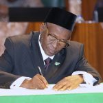 Buhari Swears-in Justice Tanko Muhammad As New CJN