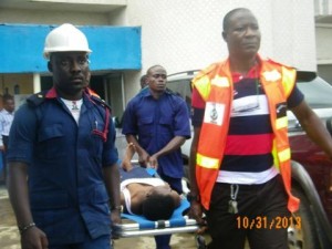 One of the students being rushed to the hospital
