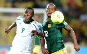 Nigeria's Striker Emenike in white scored 2 goals to dim Ethiopia's world cup dream