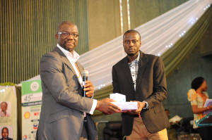 L-R: The Director, Conrad Clark presenting the Award to Alao Idris Ibrahim (the 2nd runner-up winner) during the 45th Annual National Conference of the Chartered Institute of Personnel Management (CIPM) held at the Abuja International Conference Centre between 18th-20th September, 2013.
