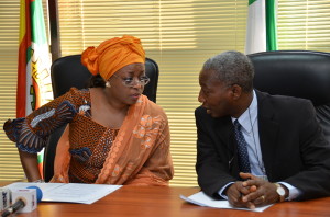 Minister of Petroleum Resources Mrs. Diezani Alison-Madueke and the Director, Department of Petroleum Resources (DPR) Engr. George Osahon at the flagging off of the Second Marginal Field Licensing Round  