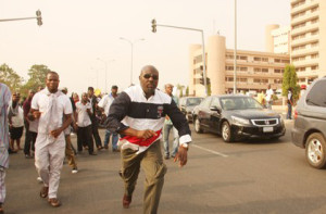 Dino Melaiye, during a protest in abuja