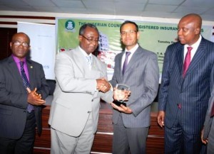 Deputy President of the Nigerian Council of Registered Insurance Brokers (NCRIB), Mr. E. K. Okunoren; NCRIB President, Mr. Ayodapo Shoderu; Acting Managing Director/CEO, Wapic Insurance Plc, Mr. Ashish Desai, and Executive Director, Technical, Wapic Insurance Plc, Mr. Folusho Alliyu, at the Wapic sponsored NCRIB members evening held in Lagos on Tuesday, December 17, 2013.