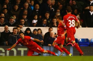 Suarez celebrates his first goal against spurs on Sunday