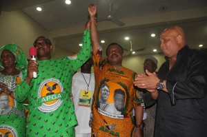 Out Going Governor Peter Obi Raises Hand of the Elected Governor of Anambra state Chief Willy Obiano